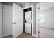 Convenient laundry area features a stacked washer and dryer, optimizing space and functionality at 147 Sunfish St, Smithfield, NC 27577