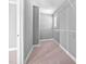 Walk-in closet features shelves and neutral carpet at 147 Sunfish St, Smithfield, NC 27577