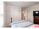 Bedroom featuring a closet, plush carpeting, and window with natural light at 1476 Burgundy Bluff Ln, Zebulon, NC 27597