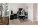 Cozy bedroom with a desk, gaming setup, and a closet for organized storage at 1476 Burgundy Bluff Ln, Zebulon, NC 27597