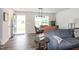 Comfortable living room blending seamlessly into the dining area with a view of the open front door at 1476 Burgundy Bluff Ln, Zebulon, NC 27597