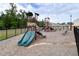 Community playground provides a safe and fun recreational space for children, featuring slides and climbing structures at 1476 Burgundy Bluff Ln, Zebulon, NC 27597