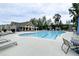 A stunning community pool with ample lounge seating and a spacious deck for residents to enjoy at 1476 Burgundy Bluff Ln, Zebulon, NC 27597