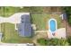 Birds eye view of backyard pool and home with a gray roof at 149 Great Oak Dr, Garner, NC 27529