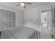 Bedroom with a grey bed and a door leading to another bedroom with a grey bed at 149 Great Oak Dr, Garner, NC 27529