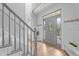 Bright foyer with staircase and decorative glass front door at 149 Great Oak Dr, Garner, NC 27529