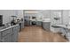 Gray and white kitchen featuring stainless steel appliances and ample cabinet space at 149 Great Oak Dr, Garner, NC 27529