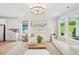 Stylish living room featuring a bright, open floor plan and natural light at 160 Serene Xing, Fuquay Varina, NC 27526