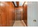 Inviting foyer with wood paneling and a well-lit atmosphere creating a warm welcome at 163 W Lillington St, Angier, NC 27501