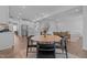 Open-concept living space featuring a dining area with kitchen island and living room views at 165 Hickory Grv Dr, Sanford, NC 27330