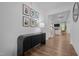 Inviting entryway with console table and art, leading to the open living spaces at 165 Hickory Grv Dr, Sanford, NC 27330