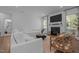 Comfortable living room with a fireplace, TV, and modern furnishings at 165 Hickory Grv Dr, Sanford, NC 27330