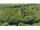 Secluded home nestled in dense woodland, offering privacy and natural beauty at 1809 Bowling Rd, Fuquay Varina, NC 27526