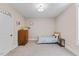 Cozy bedroom with neutral tones and ample natural light, perfect for relaxation at 1809 Bowling Rd, Fuquay Varina, NC 27526