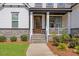 Inviting front porch and landscaping, providing a tranquil space to relax and enjoy the outdoors at 1809 Bowling Rd, Fuquay Varina, NC 27526