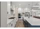 Modern kitchen featuring stainless steel appliances, hardwood floors, and a white countertop at 1809 Bowling Rd, Fuquay Varina, NC 27526