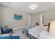Comfortable main bedroom with TV, ensuite bathroom, and large bed at 1809 Bowling Rd, Fuquay Varina, NC 27526