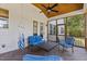 Cozy screened porch perfect for outdoor lounging with rustic wood ceiling and furniture at 1809 Bowling Rd, Fuquay Varina, NC 27526