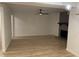 Bright and open living room features modern lighting and hardwood floors at 205 Woodhaven Dr, Burlington, NC 27217