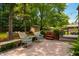 Captivating backyard featuring a well-appointed deck with comfortable seating, a hot tub, and lush greenery at 206 Lisa Dr, Carrboro, NC 27510