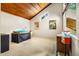 Bonus room with a vaulted wood ceiling, a storage chest, and hardwood flooring at 206 Lisa Dr, Carrboro, NC 27510