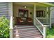 Inviting front porch with seating, offering a relaxing outdoor space at 206 Lisa Dr, Carrboro, NC 27510