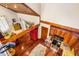 An aerial view of a large open kitchen and sitting room showcasing hardwood floors and natural light at 206 Lisa Dr, Carrboro, NC 27510