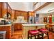 Well-appointed kitchen with granite countertops, stainless steel appliances, hardwood floors, and ample cabinet space at 206 Lisa Dr, Carrboro, NC 27510