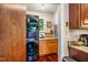 Convenient laundry room with a modern stacked washer and dryer unit, plus counter space for folding at 206 Lisa Dr, Carrboro, NC 27510
