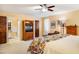 Inviting main bedroom with an ensuite bathroom, neutral walls, and ample natural light at 206 Lisa Dr, Carrboro, NC 27510