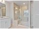 Bathroom features a walk-in shower with glass enclosure, tiled walls, and a built-in bench at 21 Whistling Way # 17, Lillington, NC 27546