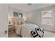 Cozy bedroom with neutral tones, decorative pillows, and soft lighting at 21 Whistling Way # 17, Lillington, NC 27546