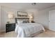 Comfortable bedroom features soft lighting, decor, and a tranquil atmosphere at 21 Whistling Way # 17, Lillington, NC 27546