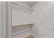 Walk-in closet featuring shelving and hanging rods providing ample storage space at 21 Whistling Way # 17, Lillington, NC 27546