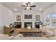 Bright living room with a fireplace, ceiling fan, and stylish decor, perfect for relaxation at 21 Whistling Way # 17, Lillington, NC 27546