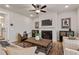 Comfortable living room with modern decor, fireplace, and a cozy seating arrangement at 21 Whistling Way # 17, Lillington, NC 27546