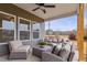 Spacious outdoor patio featuring cozy seating, and a ceiling fan for added comfort at 21 Whistling Way # 17, Lillington, NC 27546