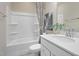 This bathroom features a single sink vanity and a shower/tub combo with a decorative shower curtain at 2301 Edenberry Ln, Fuquay Varina, NC 27526