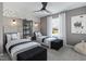 This bedroom features two beds, neutral walls, and a window that provides natural light at 2301 Edenberry Ln, Fuquay Varina, NC 27526