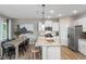 Bright kitchen with stainless steel appliances and granite countertops at 2301 Edenberry Ln, Fuquay Varina, NC 27526