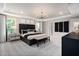 Relaxing main bedroom with trey ceiling, carpeted floors and decorative lighting at 2301 Edenberry Ln, Fuquay Varina, NC 27526