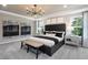 Comfortable main bedroom features large windows and cozy decor at 2301 Edenberry Ln, Fuquay Varina, NC 27526