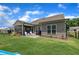 Lovely backyard with privacy fence, covered porch and lush green lawn at 2626 Nassau Trce, Fuquay Varina, NC 27526