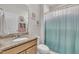 Granite counters accent this bathroom featuring a shower-tub combination and neutral wall paint at 2626 Nassau Trce, Fuquay Varina, NC 27526