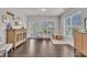 Bright bonus room with lots of light, a sideboard, and access to the home's back yard at 2626 Nassau Trce, Fuquay Varina, NC 27526
