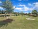 Beautiful community greenspace with cornhole boards and lush landscaping at 2626 Nassau Trce, Fuquay Varina, NC 27526