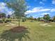 Community greenspace featuring cornhole boards and manicured landscaping at 2626 Nassau Trce, Fuquay Varina, NC 27526