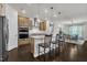 Modern kitchen featuring stainless steel appliances, granite countertops, and a stylish island with bar seating at 2626 Nassau Trce, Fuquay Varina, NC 27526