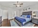 Spacious main bedroom featuring dark wood accents, ample closet space, and an ensuite bathroom at 2626 Nassau Trce, Fuquay Varina, NC 27526