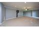 Large finished basement with neutral walls, carpet and recessed lighting at 2725 Gross Ave, Wake Forest, NC 27587